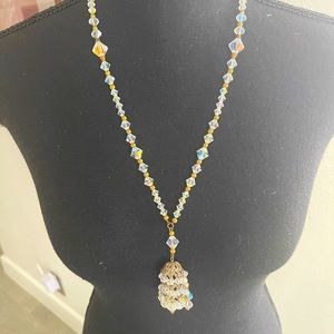 VINTAGE Beautiful necklace, with attached pendant hangs approximately 16” long